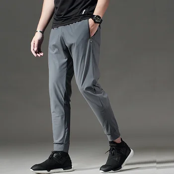 BINTUOSHI wysokiej jakości Jogger spodnie mężczyźni fitness kulturystyka spodnie dla biegaczy pot spodnie odzież sportowa